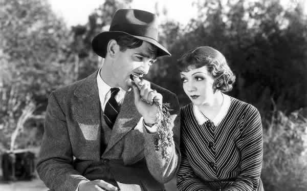 Clarke Gable eating a carrot